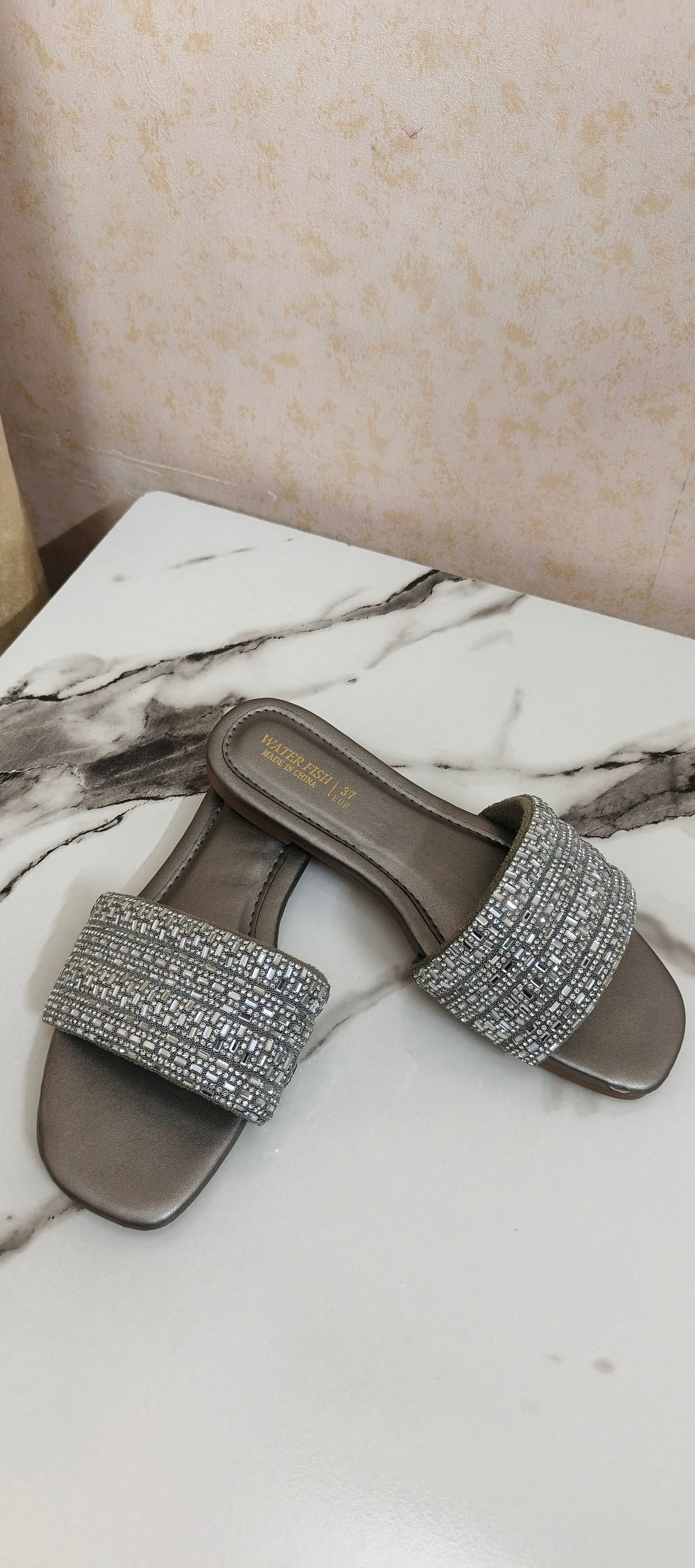 Grey embroided soft flats